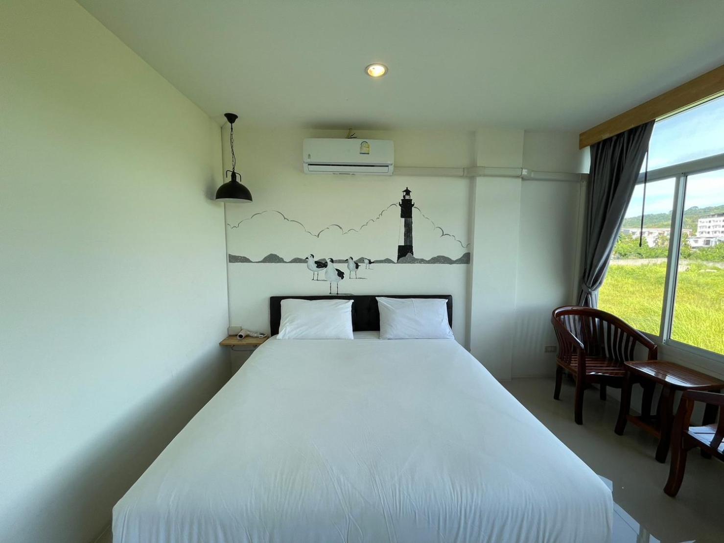 Dwell Phuket Airport Hotel At Naiyang Nai Yang Beach Exterior foto